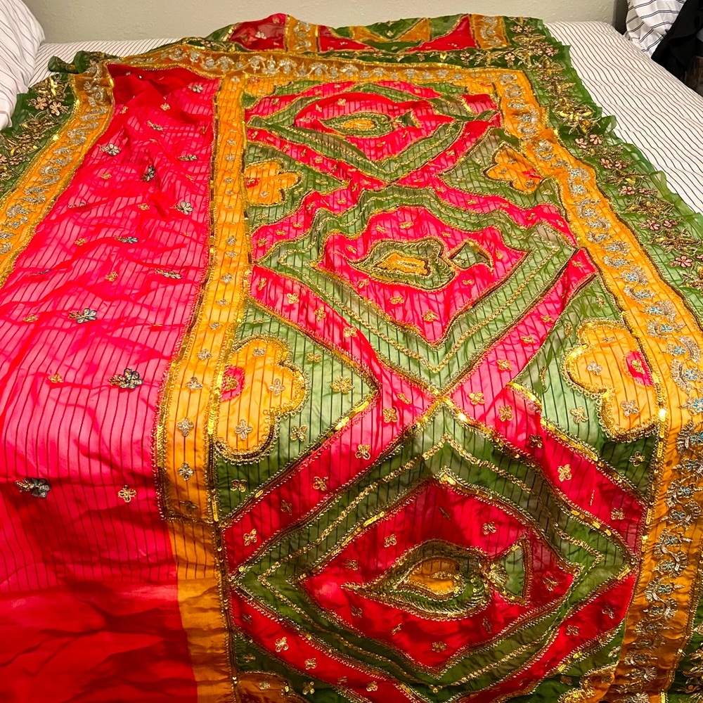 Stunning embroidered vintage green, pink, and gold saree